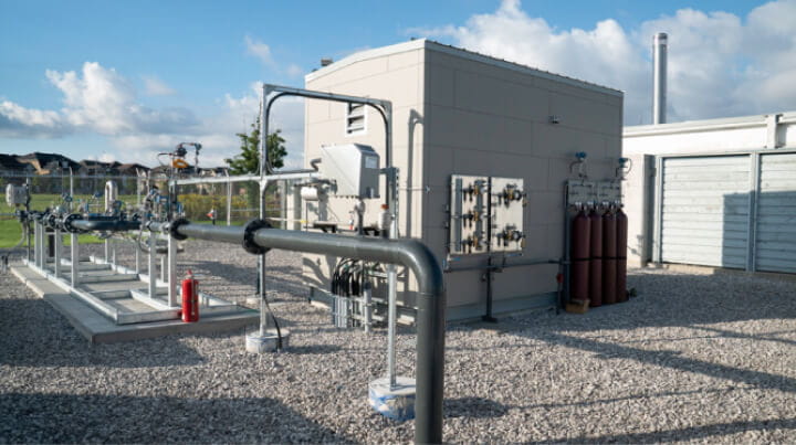 Exterior view of a hydrogen power station on a clear day.