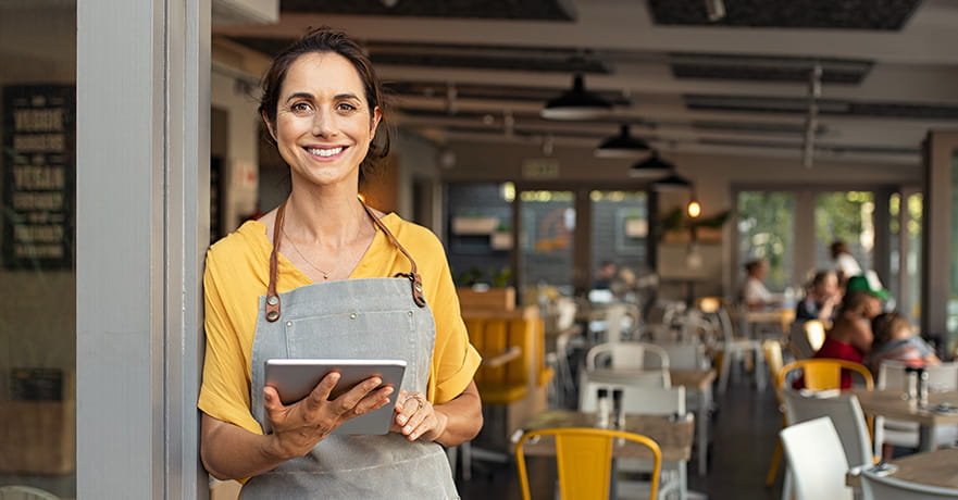 Small business owner at entrance